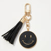 Smiley Face Coin Keychain with Tassel