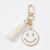 Smiley Face Coin Keychain with Tassel